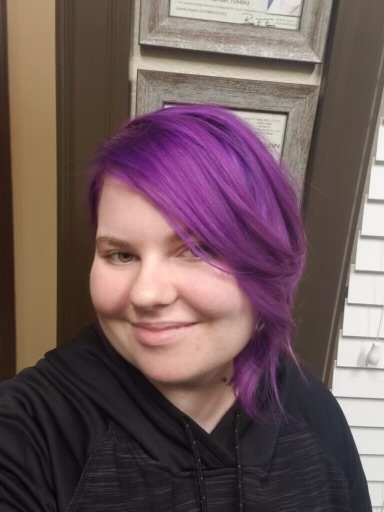 Headshot of Skyler Comin